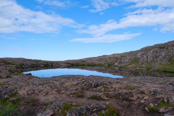 Lake on the top of a cliff near Teriberka, Murmansk region, Russia