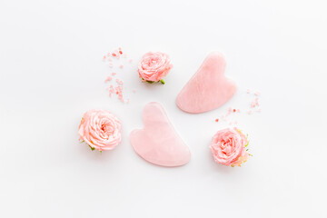 Face massage stone with roses for skin beauty care
