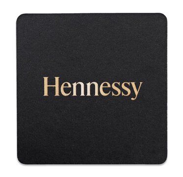 LONDON, UK - AUGUST 22, 2018: Hennessy Cognac bar paper coaster on white