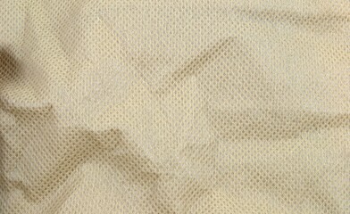 The texture of a soft yellow packaging fabric