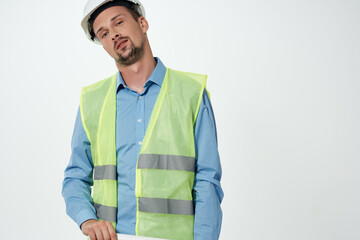 man reflective vest engineer light background