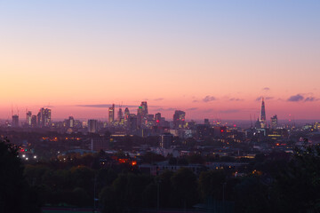 Fototapeta premium View of London city skyline at sunrise from Parliament Hill Viewpoint in England