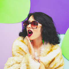 A beautiful lady with glasses, dark red lipstick, a white faux fur coat and earrings on a pop art...