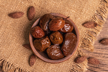 Sun-dried olives in a ceramic bowl