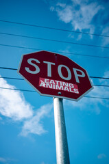 stop sign against blue sky
