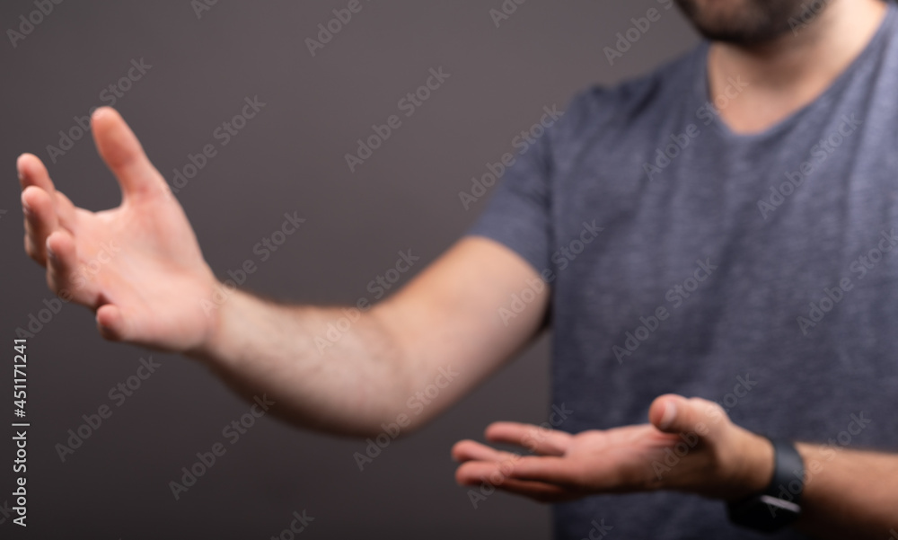 Poster man showing his empty hand.