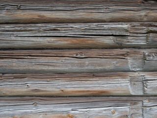 Wall of a traditional log house in a village in Karelia, northwest Russia