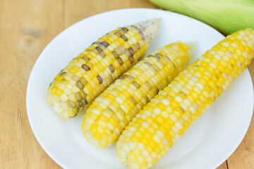 Closeup to white boiled corn 