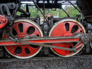 Wheels and mechanisms of a steam locomotive at the Ruskeala station in Karelia