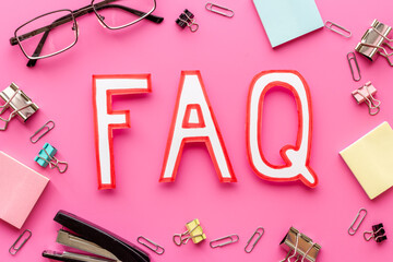 Word faq frequently asked questions with stationery on working place