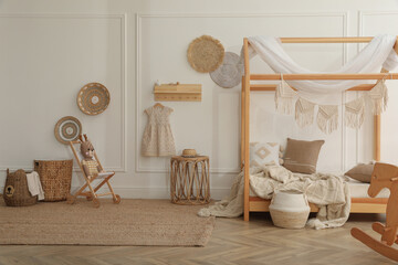 Stylish child room interior with house bed