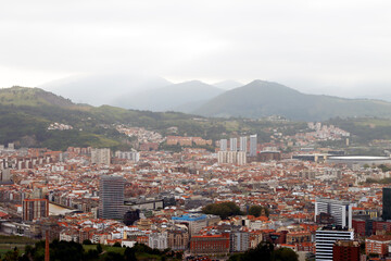 Fototapeta na wymiar Urban view of Bilbao from a hill