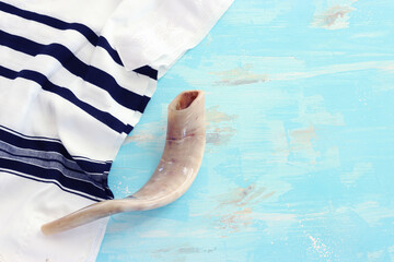 religion image of shofar (horn) on white prayer talit. Rosh hashanah (jewish New Year holiday),...