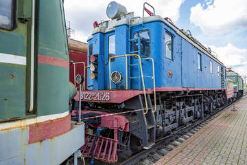 Fototapeta na wymiar Rare Soviet retro electric locomotive. Exposition area of RZD railway vehicles at Rizhskaya station. Moscow, Russia