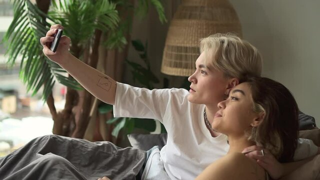 Lesbian couple at videocall woman and girlfriend say bye Spbd