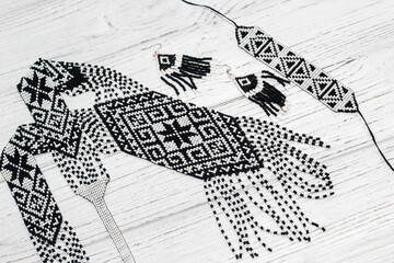 Ethnic decoration gerdan, viconane z biseru, ukrainian gerdan and earrings. hand weaving, geometric pattern.