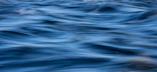 Blue tones water surface as background