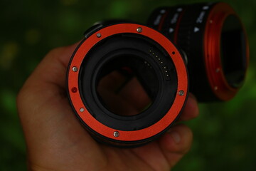 The macro rings of the dlf camera are made of black and red plastic