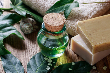 Bottle of green essential oil.