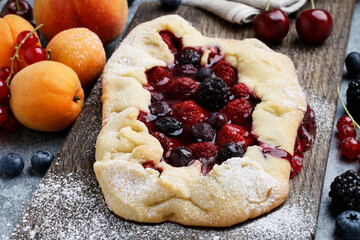 Galette - summer pie filled with fresh juicy fruits.
