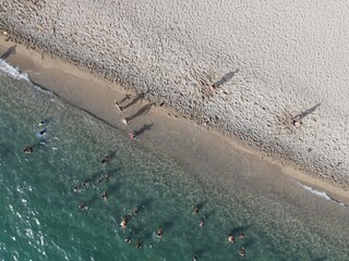 Aerial view of kanali beach crowded with tourists, famous tourist destination in preveza, epirus, greece