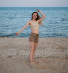 Smiling girl at the sea.