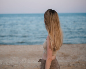 Woman looking at the sea.
