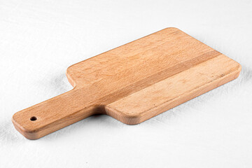 Isolated wooden cutting board on a white background