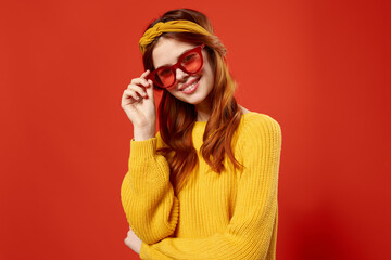 cheerful woman with yellow headband red glasses fashion hipster retro