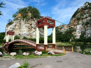 public rock mountain park at Ratchaburi, Thailand, letter on bridge label translation is 