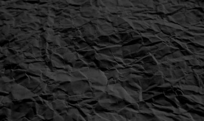 Fototapeta premium Paper texture, sheet of black wrinkled paper, abstract vector black background