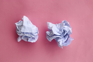 two crumpled paper ball on pink backgroud, rejection and failure concept.