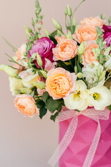 bouquet delicate flowers pink beige background