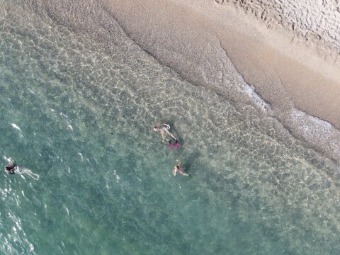 Aerial view of kanali beach crowded with tourists, famous tourist destination in preveza, epirus, greece