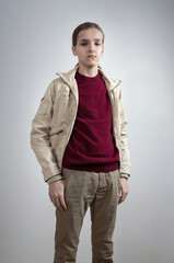 Fototapeta premium Male teenager with thumbs in pockets