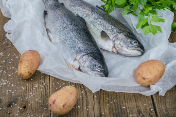 Purified trout on wooden table