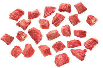 Large pieces of beef meat on a white background of isolate. sliced red meat cubes