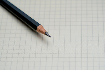Blank Notebook with black Pencil.