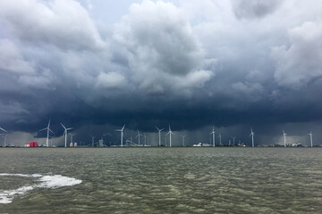 River Ems Mouth between Germany and Netherland with the Dutch Coast near Delfzijl with a storm approchaching