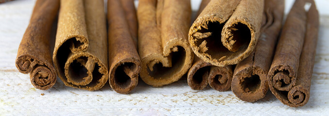 Close-up image of cinnamon sticks.
