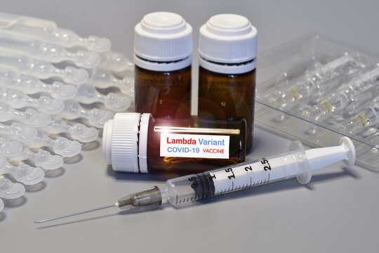 Covid-19 Lambda variant strain vaccine. Syringe and vaccine. Treatment for coronavirus covid-19.