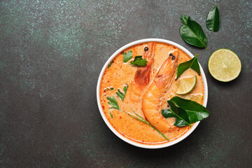 Tom Yam kung spicy Thai soup with  prawn and coconut milk. Traditional  asian spicy coconut milk soup