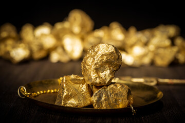 Gold concept, close-up of large gold nuggets