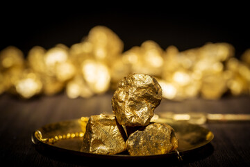 Gold concept, close-up of large gold nuggets