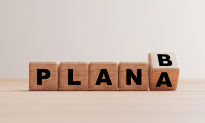 Flipping wooden cubes block for changing plan A to B on wooden table by 3d render.