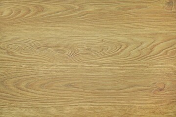Brown veneer surface with wood grain as background for construction or decoration Use it as a background in art. It can also be used to lay ceramic tiles on walls and floors.