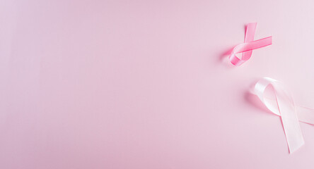 Pink ribbons on pastel background, Symbol of women's breast cancer awareness, Health care and medical concept.