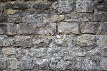 Texture. Large gray stones of medieval castle wall