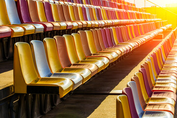 Obraz premium Empty plastic chairs in the stadium.