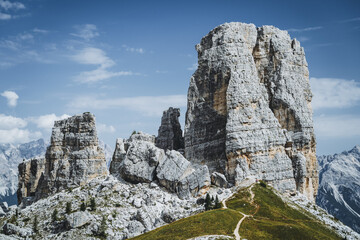 Cinque Torri Dolomites against blue summer sky. Italy